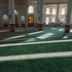 green mosque carpets in Dubai with sunlight streaming through the windows